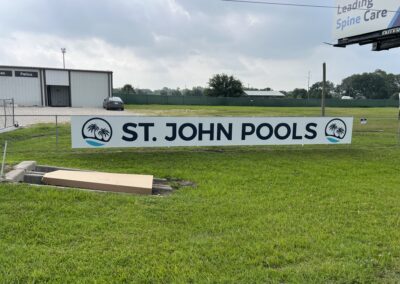 St. John Pools Sign